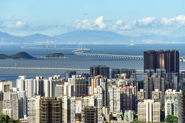 粵港澳大灣區諸城不斷突破地理界限，城市邊界日益模糊甚至趨于“消失”，看起來如同一座城市。來源：視覺中國